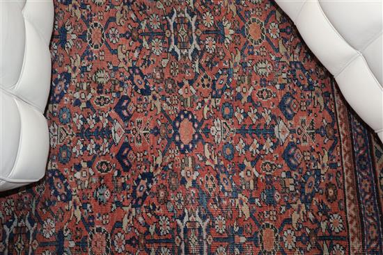 A Caucasian brick red ground carpet 280 x 273cm